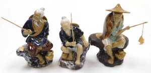 A group of 20thC Chinese Shiwan mudman figures, including fishermen, a deity with a child,... - 12