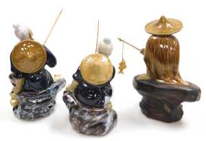 A group of 20thC Chinese Shiwan mudman figures, including fishermen, a deity with a child,... - 13