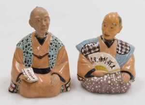 A pair of 20thC Japanese pottery nodding hakata dolls.