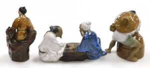 A group of 20thC Chinese Shiwan mudman figures, including two men seated playing a board game,... - 12