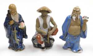 A group of 20thC Chinese Shiwan mudman figures, including two men seated playing a board game,... - 15