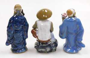 A group of 20thC Chinese Shiwan mudman figures, including two men seated playing a board game,... - 16