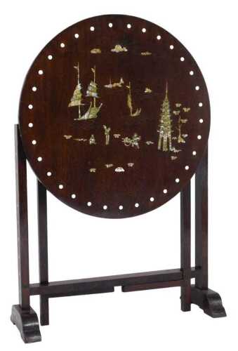 An early 20thC oak tilt top occasional table, decorated with chinoiserie motifs in stained...