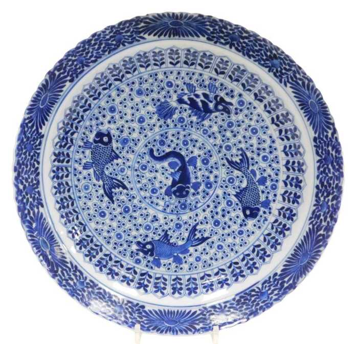 A Chinese Kangxi style blue and white porcelain dish, probably 19thC, decorated with five fish...