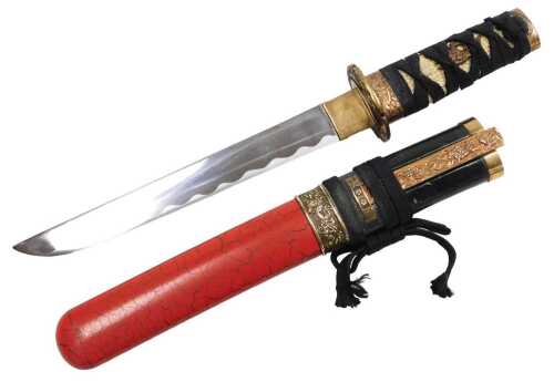 A 20thC Japanese tanto, the tsuka wrapped in ray skin, and bound with cord, the copper fittings...
