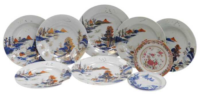 A late 18thC Chinese Imari part dinner service, decorated with a river and mountain landscape,...