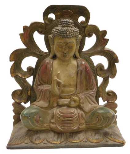 A 20thC Chinese carved wooden figure of Buddha, modelled seated in the lotus position, with a...