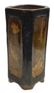 An early 20thC Chinese or Japanesevase, of canted square form, relief decorated with panels of...