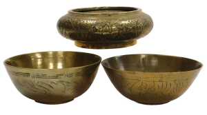 A Chinese bronze incense burner, embossed with dragons chasing a flaming pearl, apocryphal...
