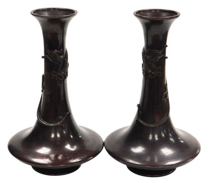 A pair of Japanese Meiji period bronze vases, of trumpet form, the neck entwined in relief with...