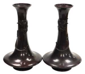 A pair of Japanese Meiji period bronze vases, of trumpet form, the neck entwined in relief with...