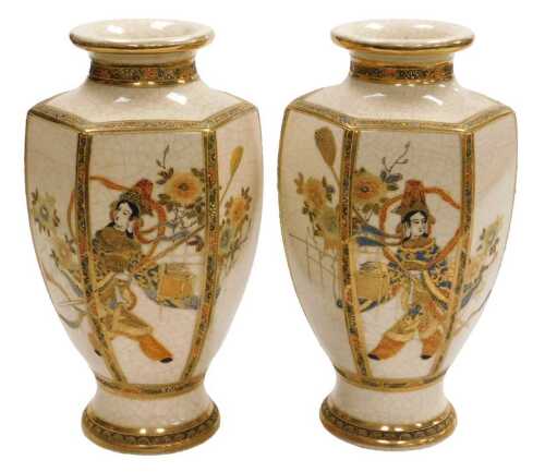 A pair of early 20thC Japanese Satsuma vases, of hexagonal baluster form, decorated with figures...