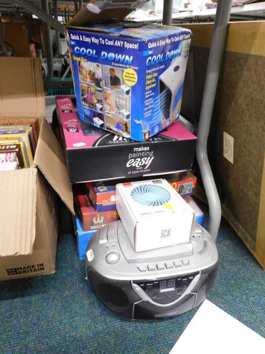 Electrical items to include a portable CD player, a Cool-Down fan, together with various jigsaws...