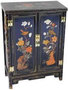 A Chinese black lacquer cabinet, of rectangular form, decorated with flowers, and overlaid in...