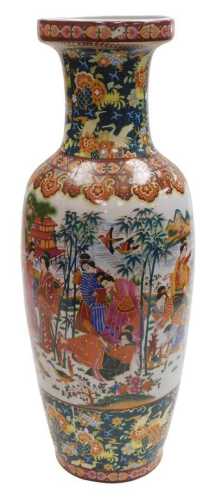 A Chinese porcelain vase, of shouldered tapering form, polychrome decorated with women in a...