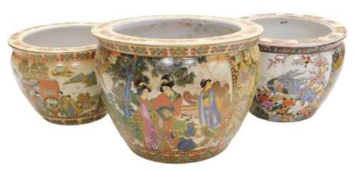 A pair of late 20thC Chinese Satsuma style pottery graduated goldfish bowls, decorated with...