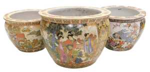 A pair of late 20thC Chinese Satsuma style pottery graduated goldfish bowls, decorated with...