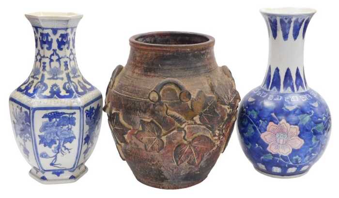 Two late 20thC Chinese blue and white porcelain vases, 36cm high, together with a rustic...