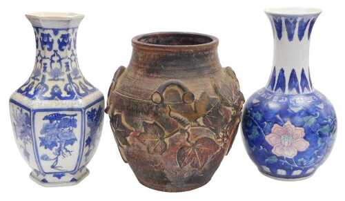 Two late 20thC Chinese blue and white porcelain vases, 36cm high, together with a rustic...