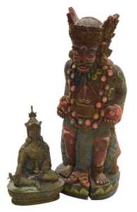A Tibetan brass figure of Padmasambhava, modelled seated on a lotus flower base, 22cm high,...
