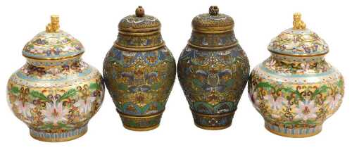 A pair of 20thC Chinese cloisonne jars and covers, decorated with peonies, on a gold ground,...