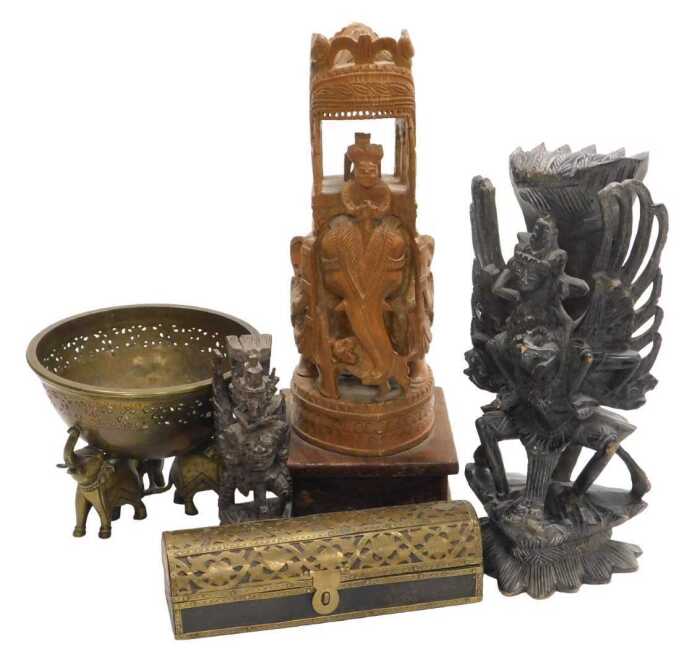 An Indian hardwood carving of Lord Vishnu riding atop Garuda, 5cm high, another smaller similar...