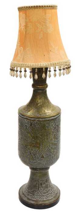 An early 20thC Anglo-Indian brass vase, converted to a table lamp, embossed with huntsman, gurus,...