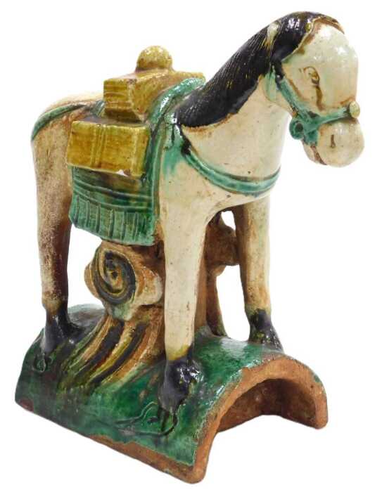 A Ming dynasty style sancai terracotta ridge tile, modelled as a horse, saddled and bridled up,...