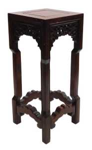 A small Chinese hardwood urn stand, of square section, with scrolling fretwork raised on square...