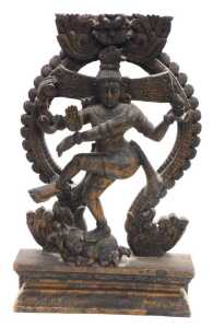 A 20thC Nataraja carved wooden sculpture of Lord Shiva, balanced on a dwarf Apasmara holding a...