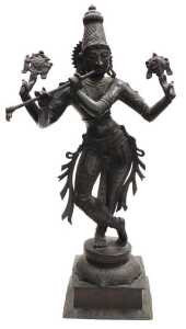 A 20thC bronze figure of Lord Krishna, modelled standing, in a cross legged pose, playing a...