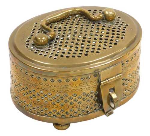 A 19thC Indian brass pandan box, of oval form, with handle to the lid, raised on four bun feet,...