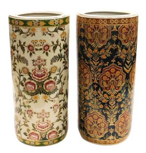 A Chinese porcelain stick stand, of cylindrical form, polychrome decorated with flowers, printed...