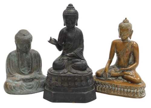Three 19thC and later bronze figures of Buddha, each modelled seated in the lotus position, two...