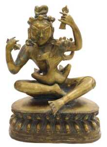 A 19thC Tibetan bronze figure of Mahasiddha Ghantapa and his consort, modelled in embrace,...