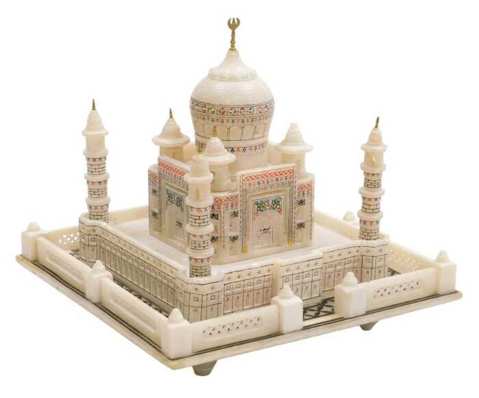 An Indian alabaster illuminated model of the Taj Mahal, 8.5cm high, 20.5cm wide.