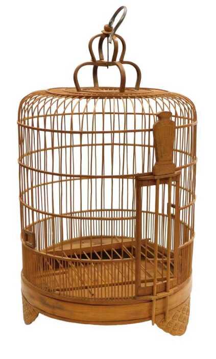 A Chinese bamboo bird cage, of cylindrical form, with a crown surmount, raised on three scroll...