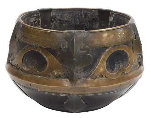 A 19thC Indian wooden and brass sherpai, or kunke, from the Bengal, the wooden shaped measuring...