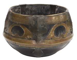 A 19thC Indian wooden and brass sherpai, or kunke, from the Bengal, the wooden shaped measuring...