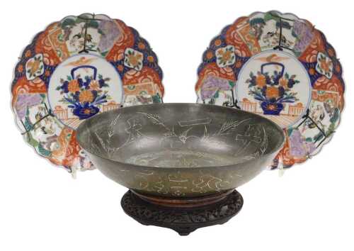 A pair of Meiji period Japanese Imari dishes, of fluted form, decorated with reserves of cranes...