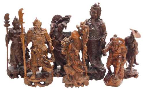 A group of 19thC and later Chinese hardwood figures, including Guanyin, Guan Yu, Shou Lao, and...