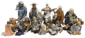 A group of 20thC Chinese Shiwan mudman figures, including fishermen, deities, musician, etc. (2...