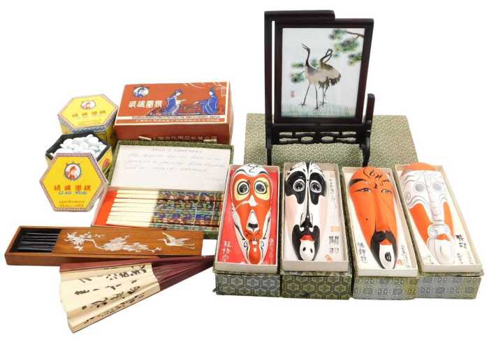 Four Chinese pottery opera masks, a set of cloisonne chopsticks, a table screen, paper fan, etc....