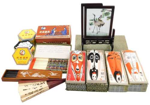 Four Chinese pottery opera masks, a set of cloisonne chopsticks, a table screen, paper fan, etc....
