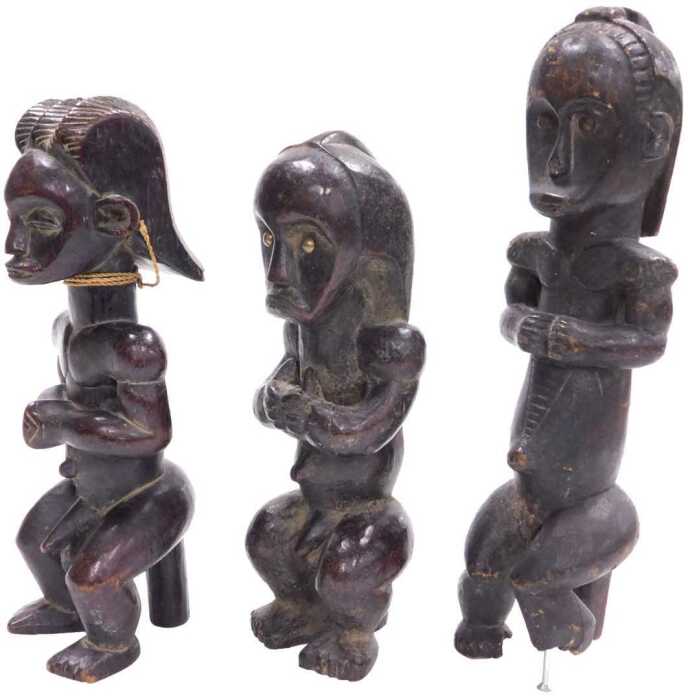 Three Gabonese Fang reliquary guardian figures, 34cm, 26cm and 28cm high respectively. (1 AF)