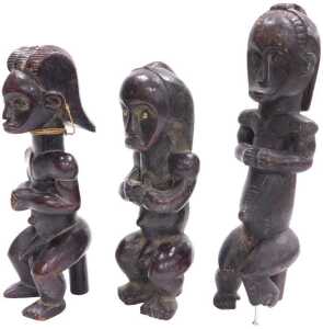 Three Gabonese Fang reliquary guardian figures, 34cm, 26cm and 28cm high respectively. (1 AF)
