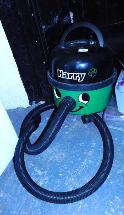 A Henry Numatic International vacuum cleaner, model HHR200-11, lacking hoover head.