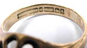 A 9ct gold and single red stone ring, claw set, size P&frac12;, 4.6g. - 3