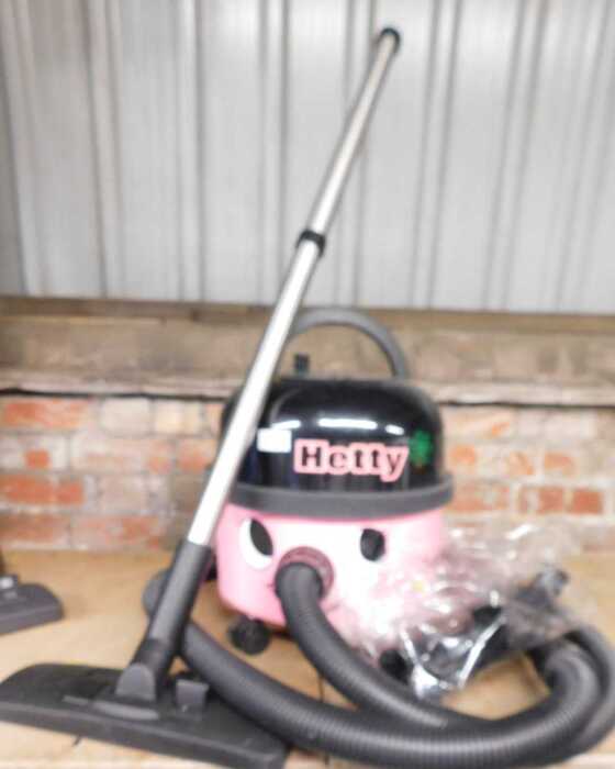 A Hetty vacuum cleaner, with attachments.