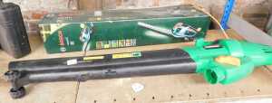 A Power Base electric leaf blower, together with a Bosch cordless hedge trimmer, AHS52TL, boxed.